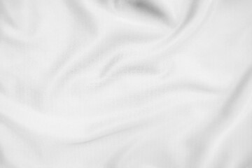 Abstract white fabric texture background. Wavy white cloth.