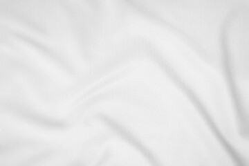 Abstract white fabric texture background. Wavy white cloth.