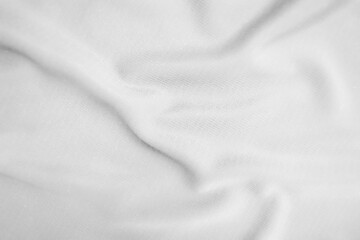 Abstract white fabric texture background. Wavy white cloth.