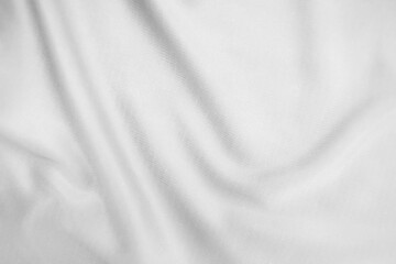 Abstract white fabric texture background. Wavy white cloth.