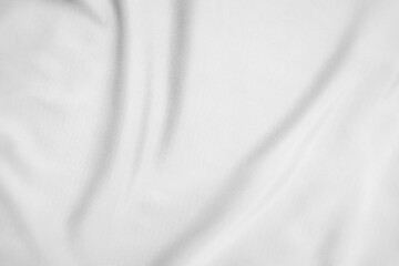 Naklejka premium Abstract white fabric texture background. Wavy white cloth.