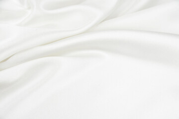 Fototapeta na wymiar White satin fabric with gentle curves