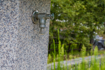 Water faucet on marble