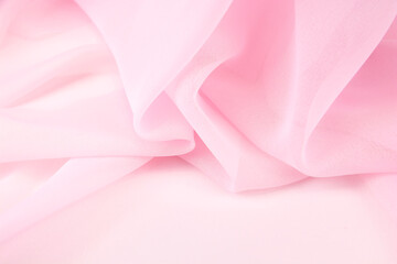 Pink satin fabric with delicate curves