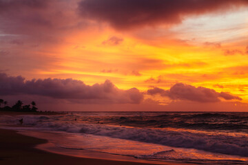 Fototapeta na wymiar Golden Sunrise over Sandy Beach, Hawaii 