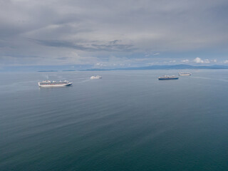 Beautiful aerial view of an empty Gigantic Cruise ship park in Costa Rica due to quarantine
