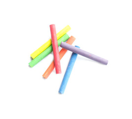 Fototapeta premium chalks in a variety of colors arranged on a white background