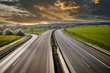 Autobahn landscape with dramatic clouds
