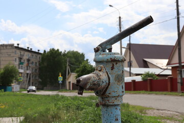 Water pump on the village street