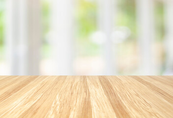 beautiful empty wood table with blur modern white kitchen and coffee cafe with window background, interior clean tone . Ready for product display  montage.