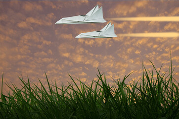 Fast flying jets in the golden sky in the morning