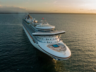 Fototapeta premium Beautiful aerial view of an empty Gigantic Cruise ship park in Costa Rica due to quarantine