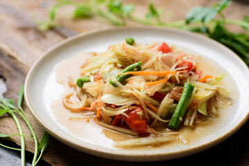 Thai food, Spicy papaya salad (Som Tum) on plate