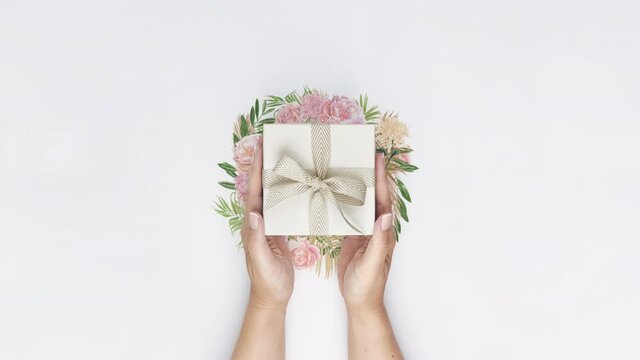 woman holding a gift box beige bow flower romantic tropical  watercolor illustration flora palm leaf party birthday holiday Christmas 