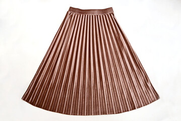 Pleated skirt close up on light background. 