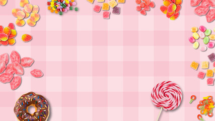 Colorful Candys on table, top view, copy space. Mini Colorful chocolates, Lolipop, Donuts