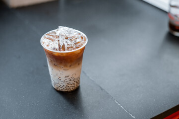 black coffee with sago on plastic glass