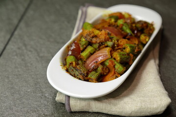 A plate of spicy and tangy Bhindi Do Pyaza or Bhindo Masala