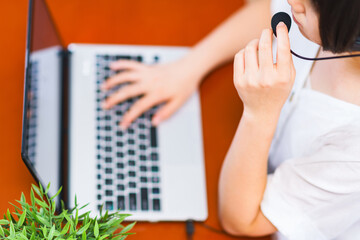 Japanese young business person works online at home