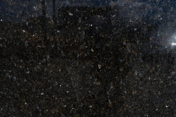 granite texture. stone dark background glare