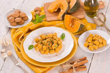 Pumpkin gnocchi with grated amaretti cookies.	