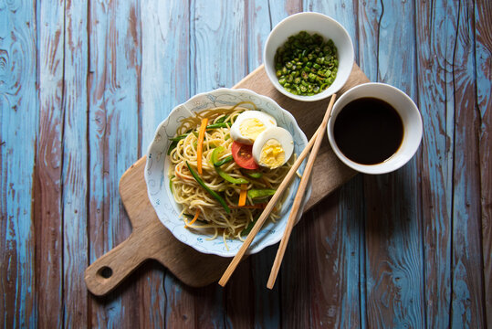 Noodles On A Platter With Condiments With Use Of Selective Focus