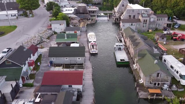 Leland Historic District - Historic Fishtown In Leland, Michigan With Boats On The Coast Of Lake Michigan. - aerial drone