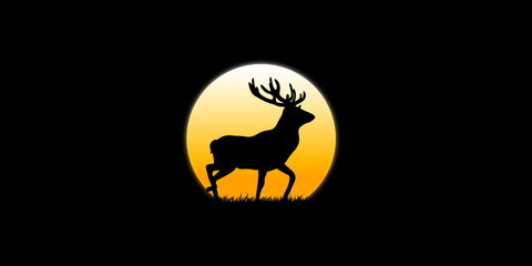 The deer walks in the dark moonlight in the dark