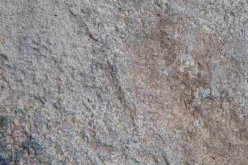 gray stone texture with inclusion and homogeneous background of the rock