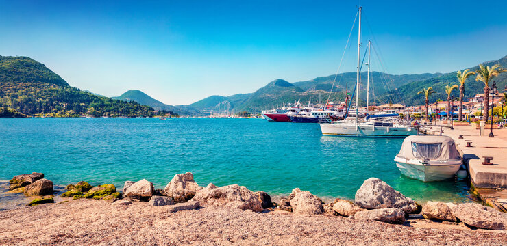 Panoramic morning view of port Nydri. Stunning spring seascape of Ionian Sea. Bright  outdoor scene of Lefkada island, Greece, Europe. Traveling concept background.