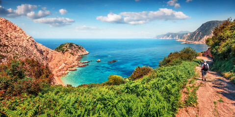 Abandoned country road to Agia Eleni beach. Amazing morning seascape of Mediterranean Sea....