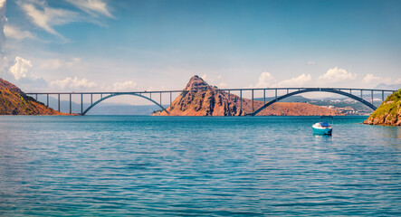 Obraz premium Wonderful morning view of bridge to Krk island. Warm sumer day on Croatia, Europe. Beautiful world of Mediterranean countries. Traveling concept background.