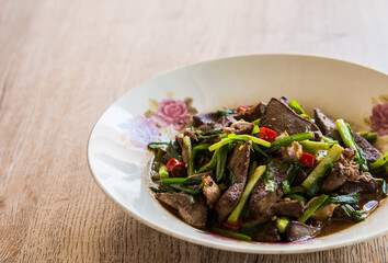 Fried pork liver with Chinese chives , Thai famous  food
