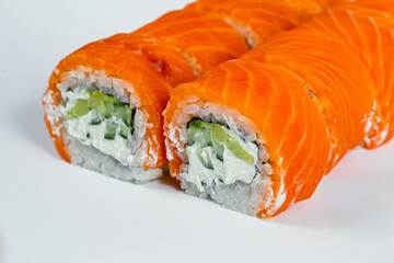 Sushi rolls philadelphia classic with fresh salmon and cream cheese. Japanese traditional food