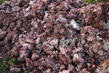 textures of various clay layers underground in  clay quarry after  geological study of  soil. colored layers of clay and stone in  section of  earth, different rock formations and soil layers.
