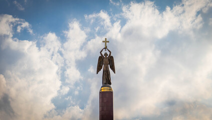 Obelisk guardian angel over the cities