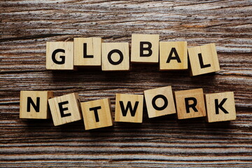 Fototapeta premium Global Network alphabet letter on wooden background