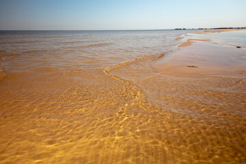 Beautiful sandy beach on a sunny summer day. Baltics. The coast of the Gulf of Finland. Estonia. Ust-Narva.