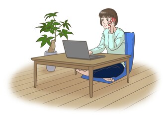 A remote working young woman talking on the phone in front of the laptop