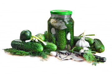 Tinned green cucumbers in a glass jar. Isolate.