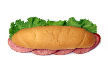 Long sandwich with pepperoni and herbs. View from above. Isolate on white.