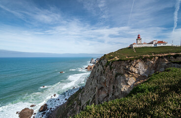 Fototapeta na wymiar Lighthouse and Atlantic ocean at Cabo da Roca, Portugal - the westernmost extent of continental Europe