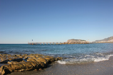 Alanya, TURKEY - August 10, 2013: Travel to Turkey. Beaches on the sea. Waves on the Mediterranean coast.