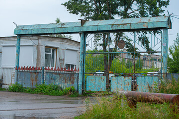 Fototapeta na wymiar sliding iron gates at the factory