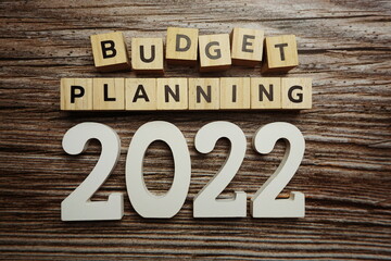 Budget Planning 2022 alphabet letters on wooden background