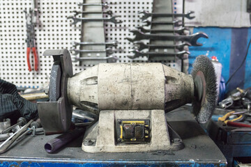 motorized sanding tool in garage