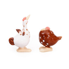 Two funny chicken figures isolated on a white background