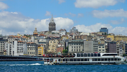 Fototapeta na wymiar View to Galata district across Bay of Golden Horn on overcast day