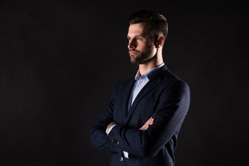 Profile side view portrait of his he nice attractive content elegant well-dressed guy successful skilled shark agent broker financier specialist folded arms isolated on dark black color background