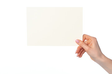 Woman's hand holding blank white sheet of paper isolated on white